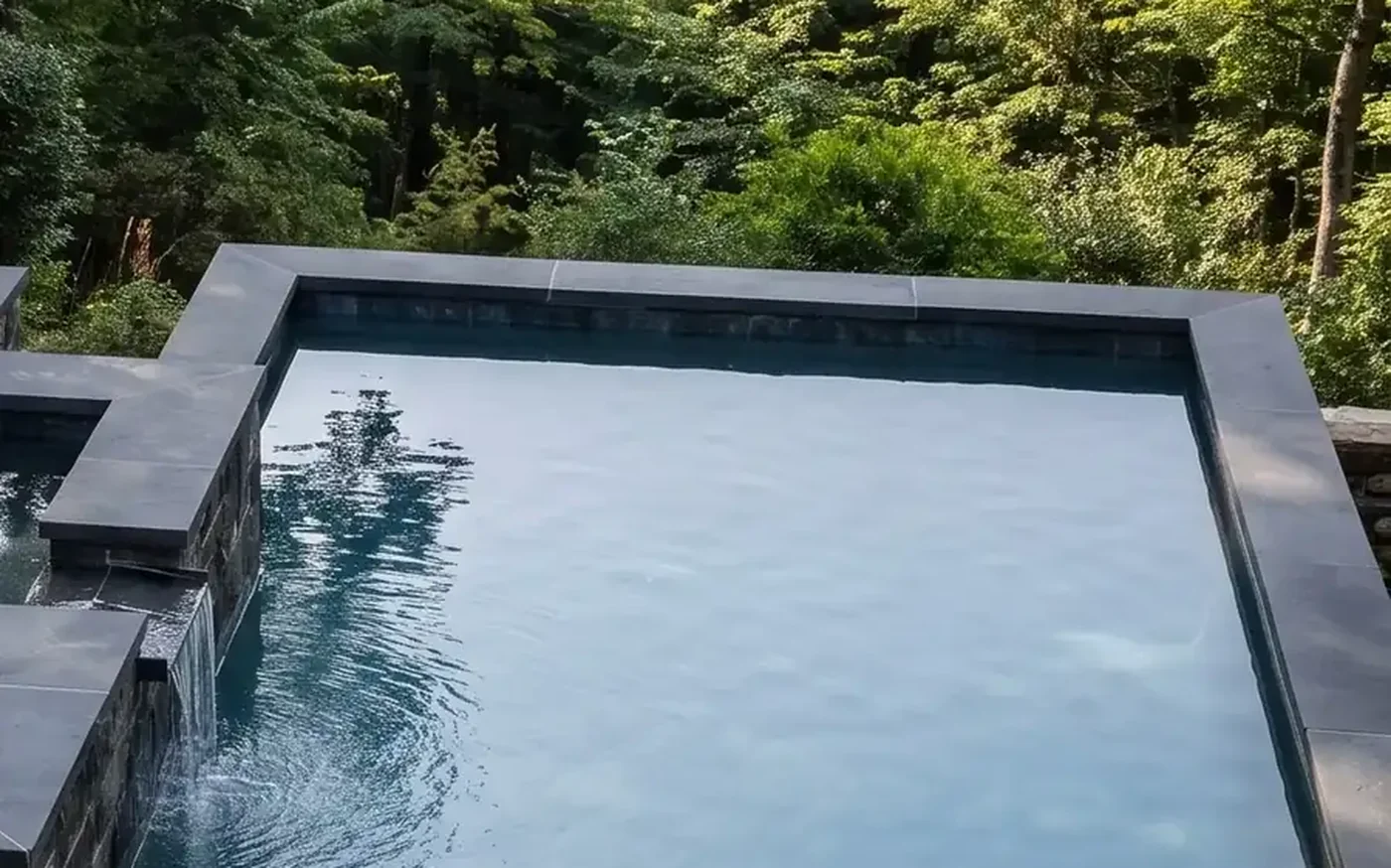 Gunite pool with a spillover spa
