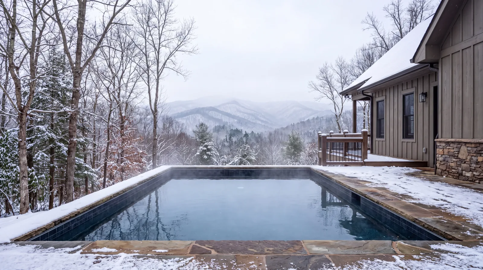 A heated pool in use in the snow