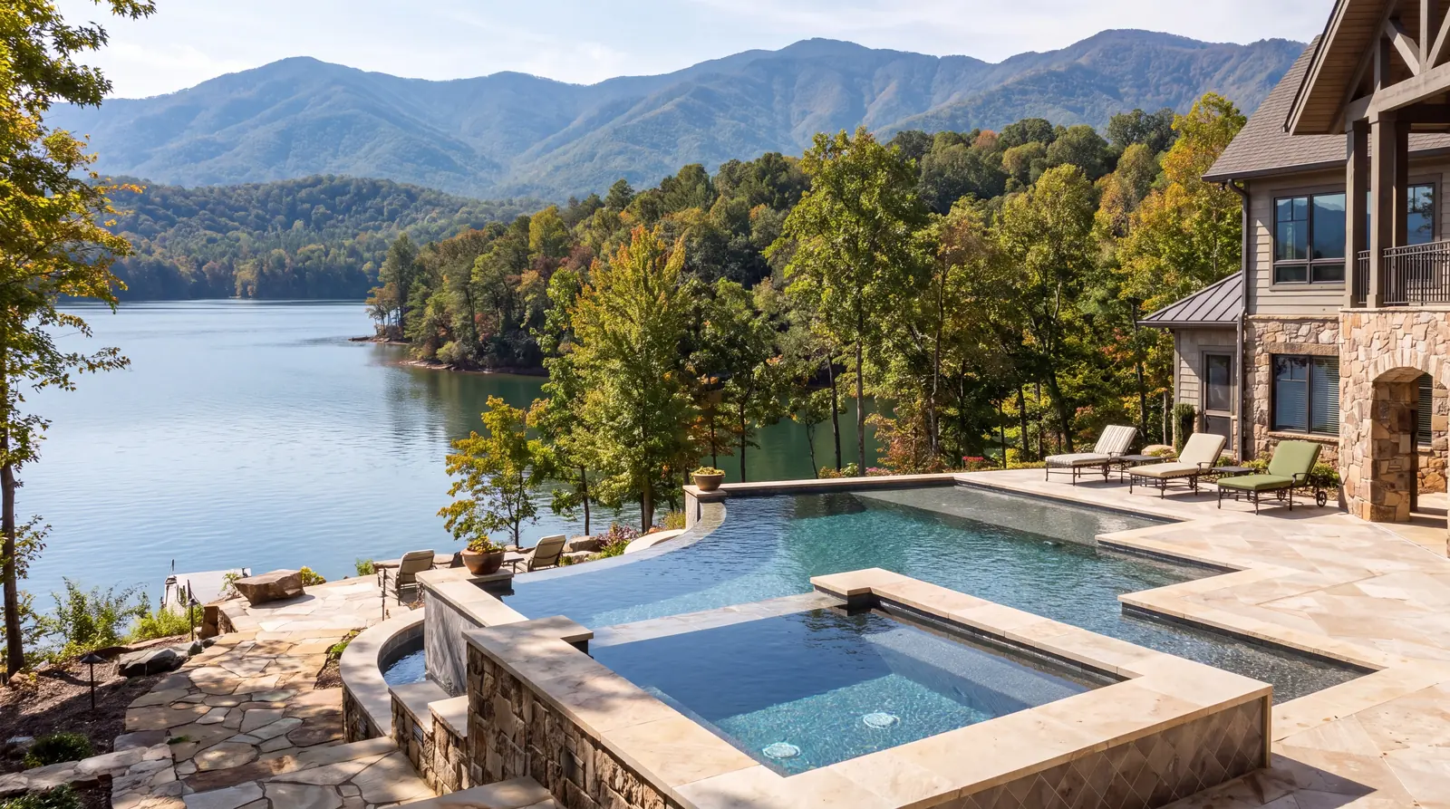 Infinity edge pool and spa overlooking a lake