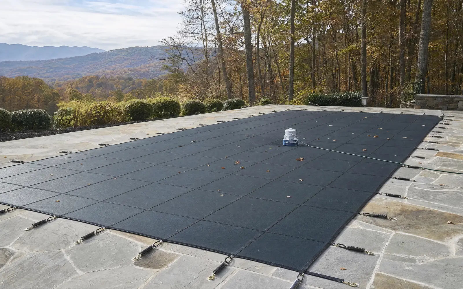Mesh safety cover on a pool