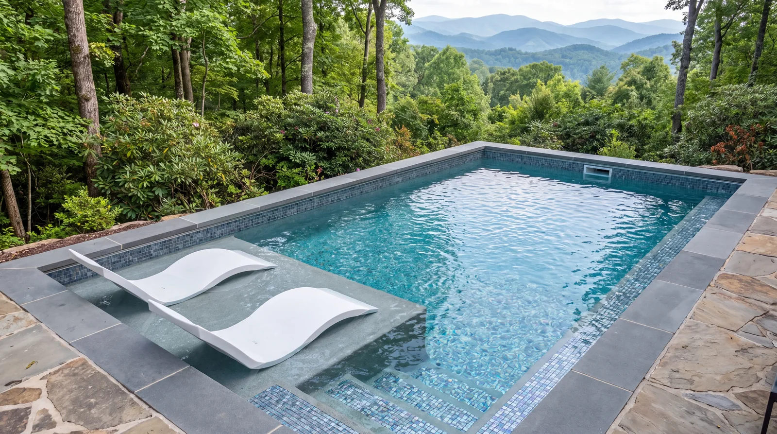 Pool with a tanning ledge and in water loungers