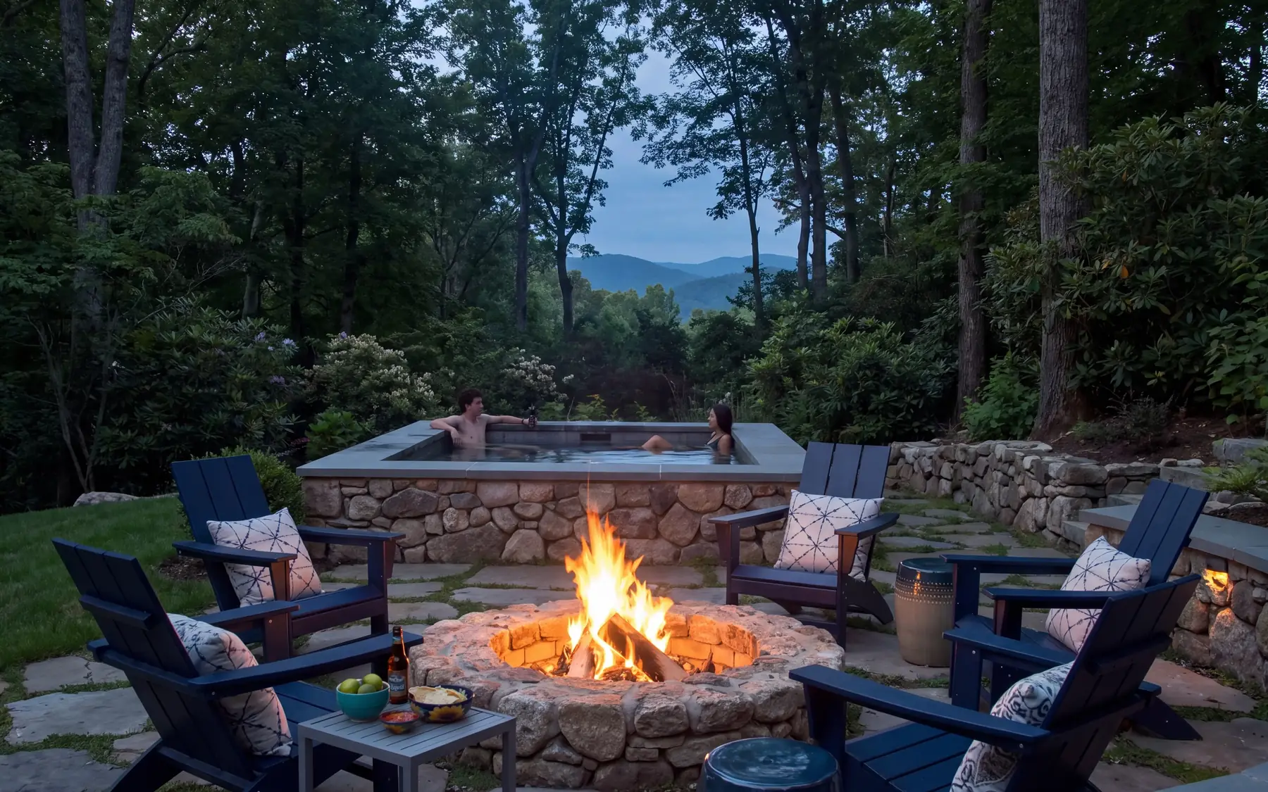 Raised spa and fire pit with a mountain view