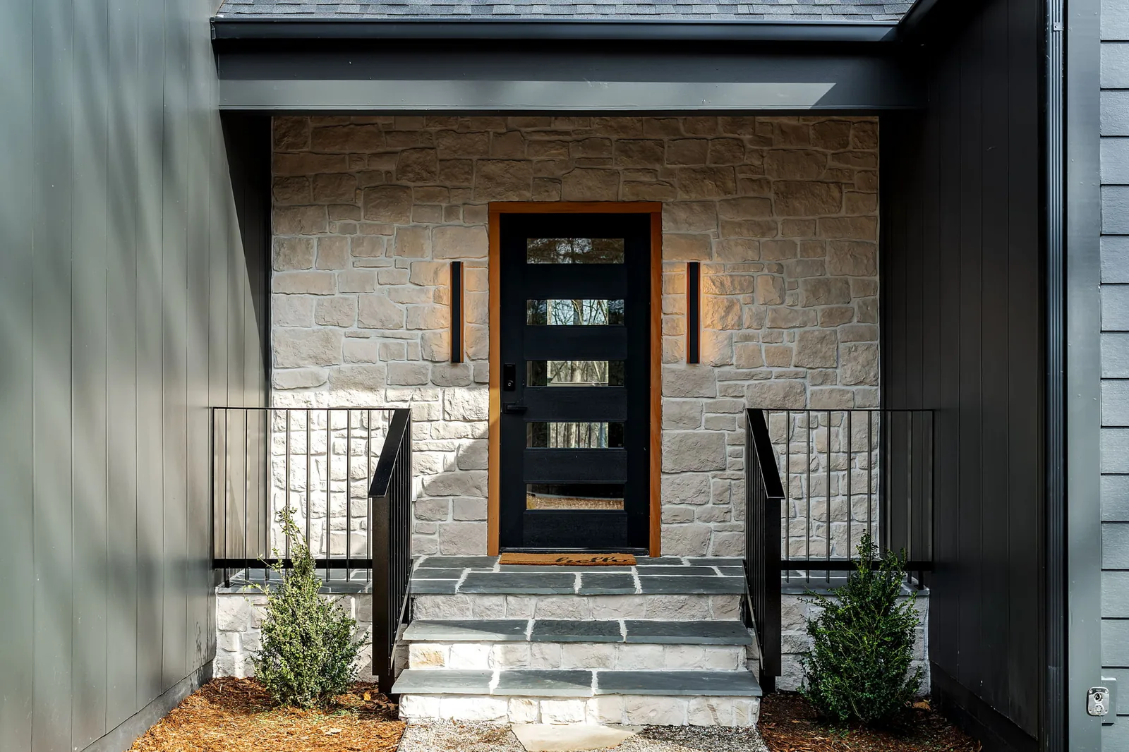 Stone entry and bluestone steps on a home we built