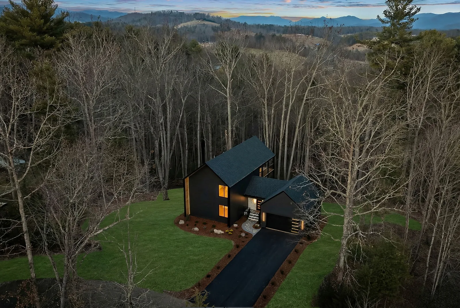 A home we built on a wooded mountain lot, seen from above